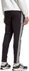 Spodnie męskie adidas Essentials Single Jersey Tapered Open Hem 3-Stripes czarne IC0044