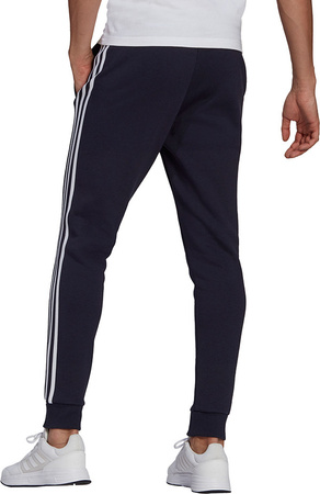 Spodnie męskie adidas Essentials Fleece Tapered Cuff 3-Band Pants granatowe GK8823