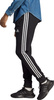 Spodnie męskie adidas Essentials French Terry Tapered Cuff 3-Stripes czarne HA4337