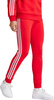 Spodnie damskie dresowe joggery adidas Essentials 3-Stripes Fleece czerwone IY1719