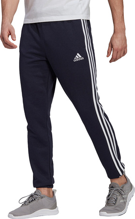 Spodnie męskie adidas Essentials Tapered Elastic Cuff 3 Stripes Pant granatowe GK8830