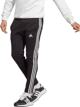 Spodnie męskie adidas Essentials Single Jersey Tapered Open Hem 3-Stripes czarne IC0044