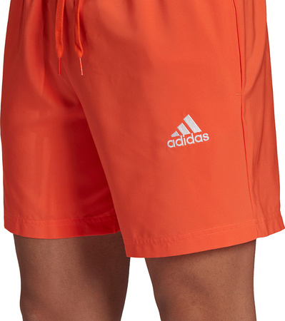 Spodenki treningowe krótkie męskie adidas SL Essentials Chelsea pomarańczowe GK9606
