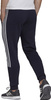 Spodnie męskie adidas Essentials Tapered Cuff 3 Stripes granatowe GK8977