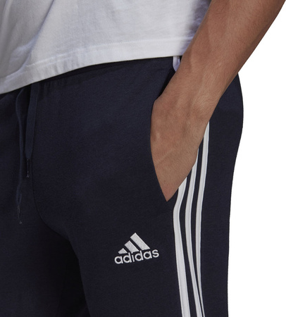 Spodnie męskie adidas Essentials Slim 3 Stripes Pants granatowe GM1090