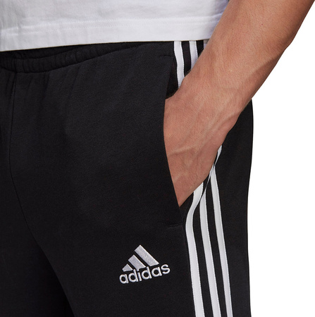 Spodnie męskie adidas Essentials Tapered Cuff 3 Stripes czarne GK8831