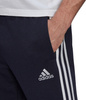 Spodnie męskie adidas Essentials Tapered Elastic Cuff 3 Stripes Pant granatowe GK8830